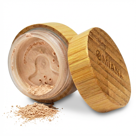 Open container of loose powder with a wooden lid on a white background